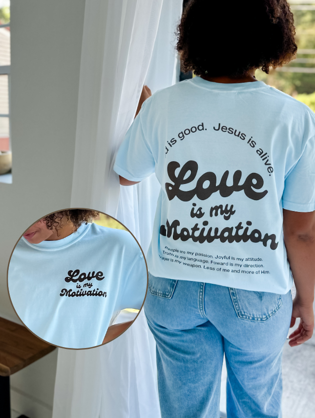 model wearing Love Is My Motivation Tee