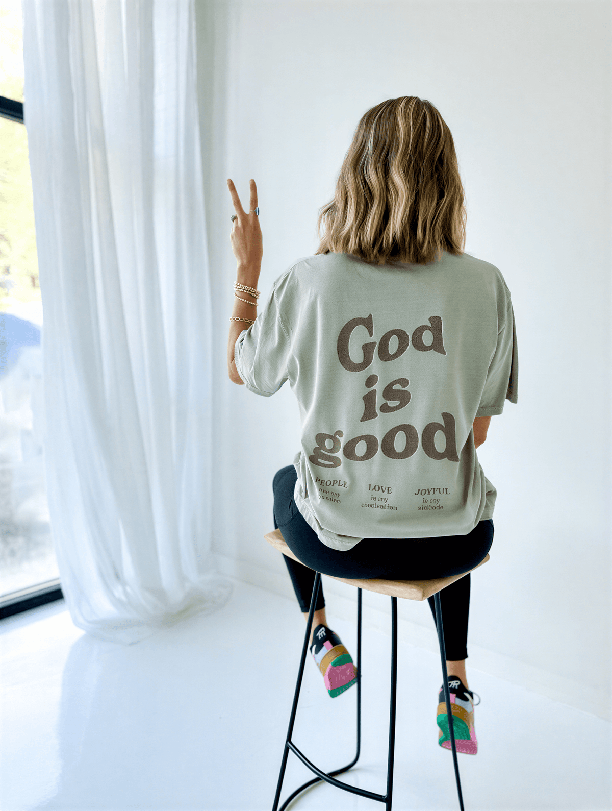 model wearing God Is Good Tee