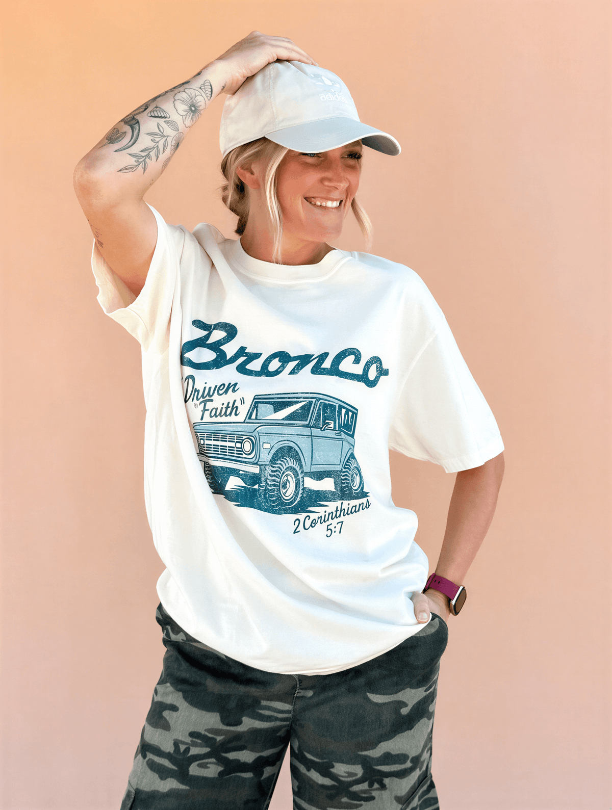 model wearing Driven By Faith Bronco Tee