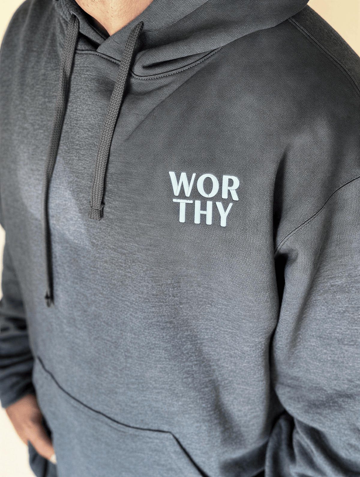 model wearing Worthy Embroidered Hoodie - Charcoal