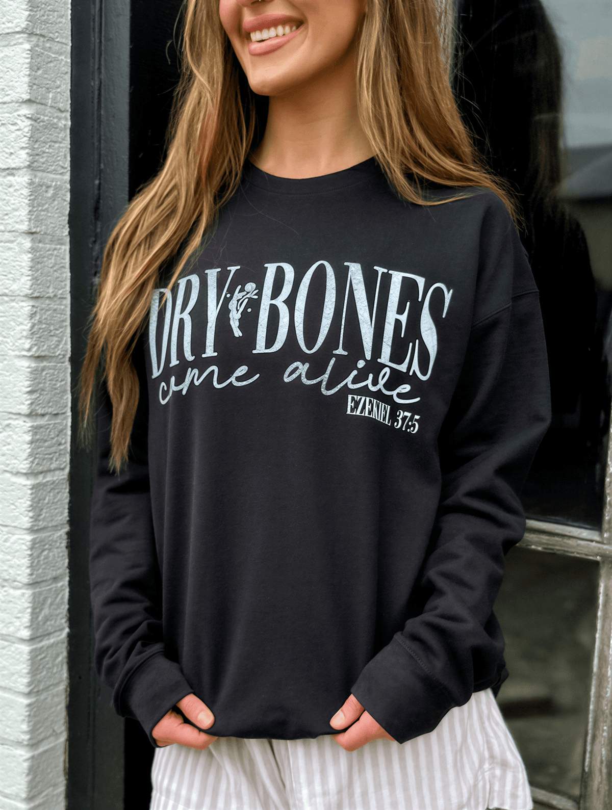 model wearing Dry Bones Come Alive Sweatshirt