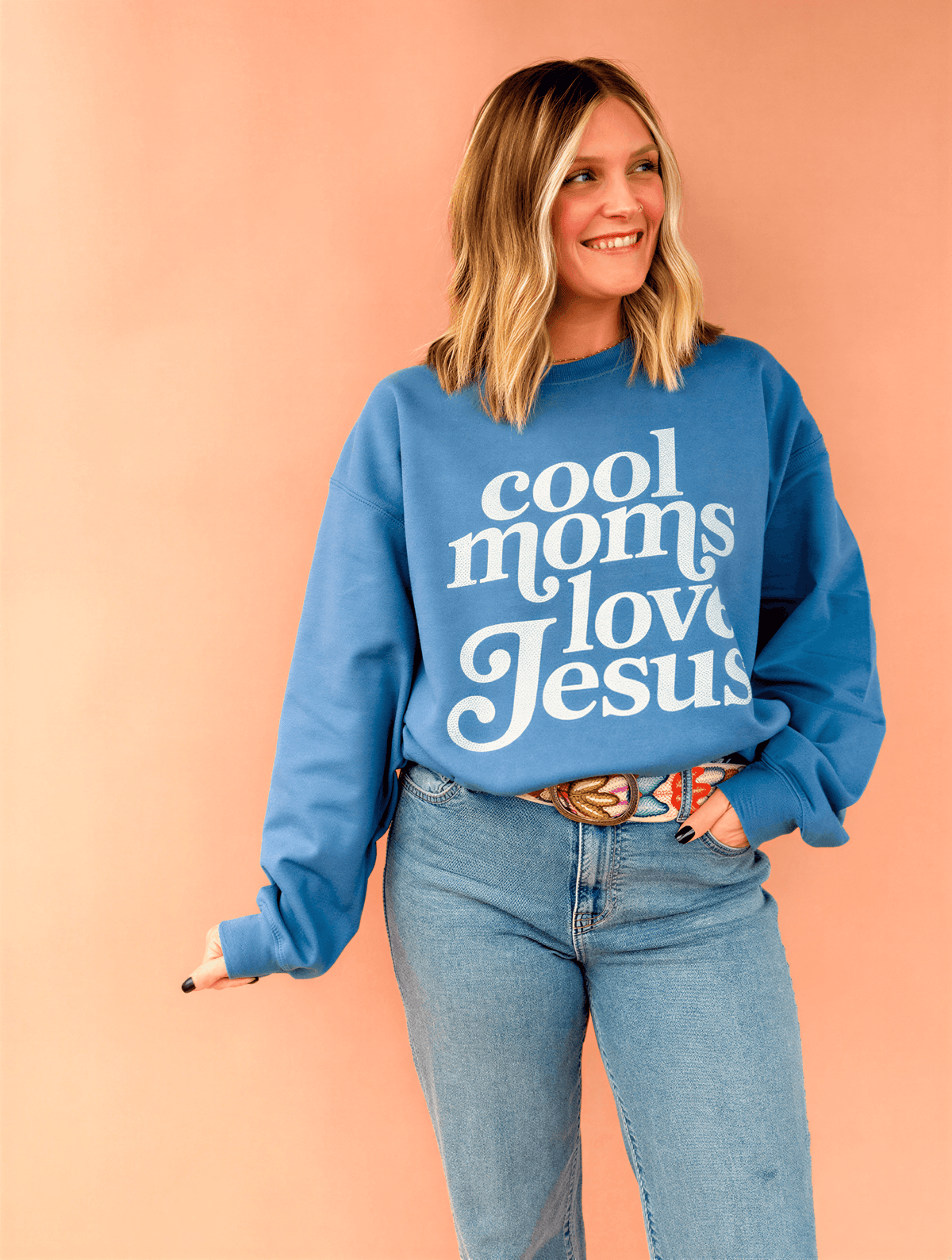 model wearing Cool Moms Love Jesus - Indigo Sweatshirt