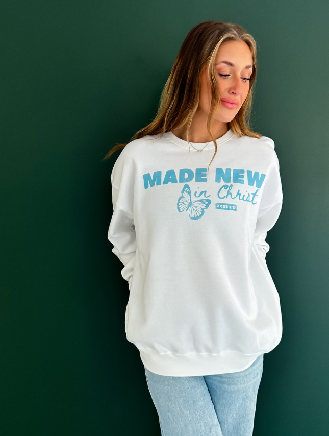 model wearing Made New In Christ Sweatshirt