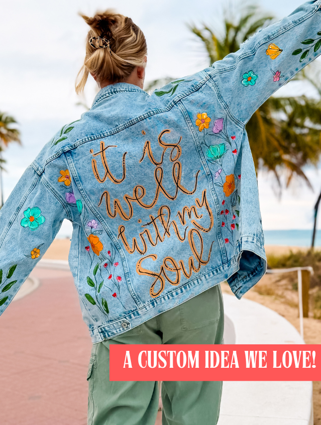 model wearing custom painted denim jacket