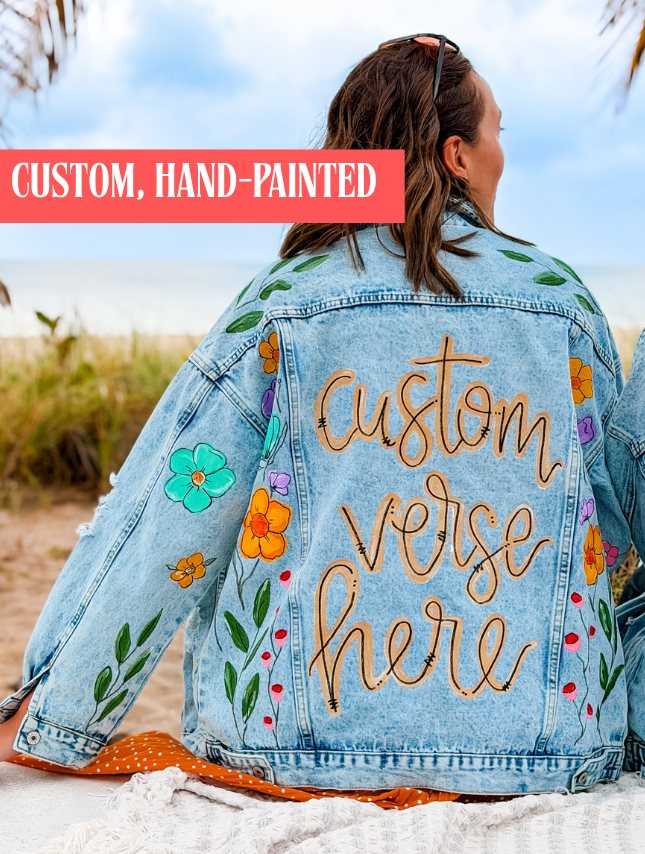 model wearing custom painted denim jacket