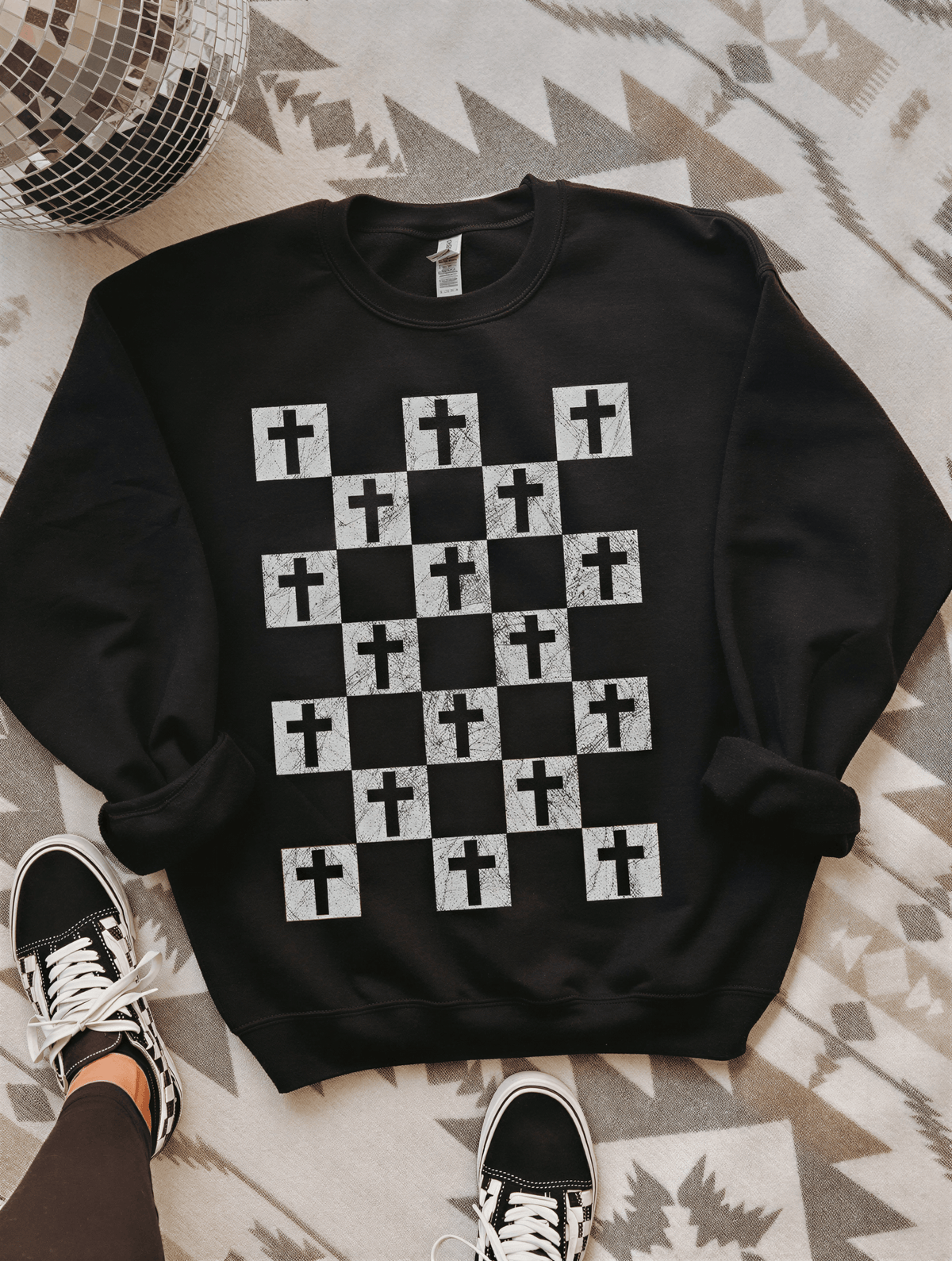 flay lay of Bold Crosses - Black Sweatshirt