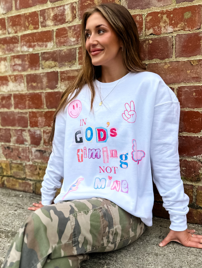 model wearing In God's Timing Sweatshirt