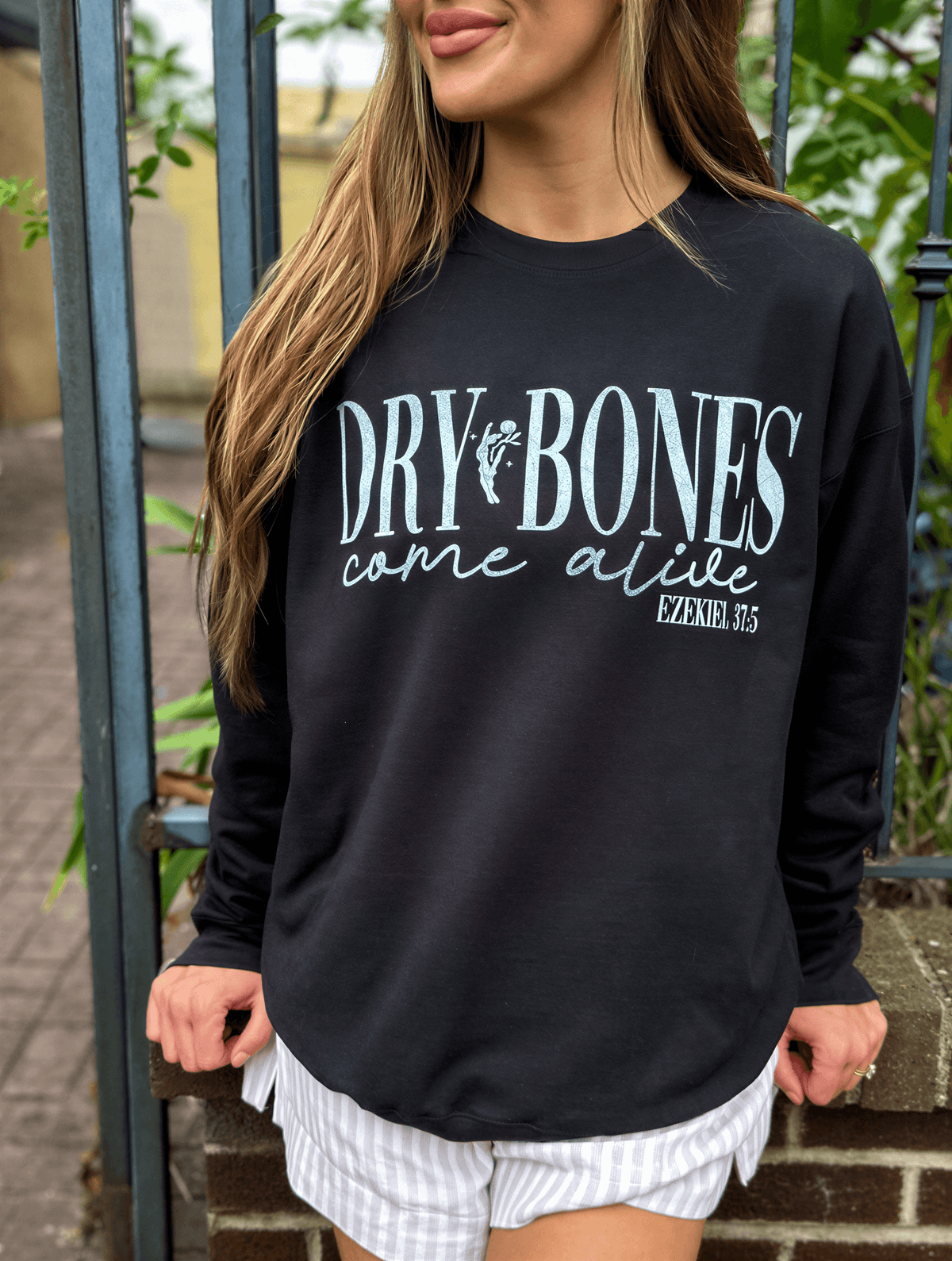 model wearing Dry Bones Come Alive Sweatshirt