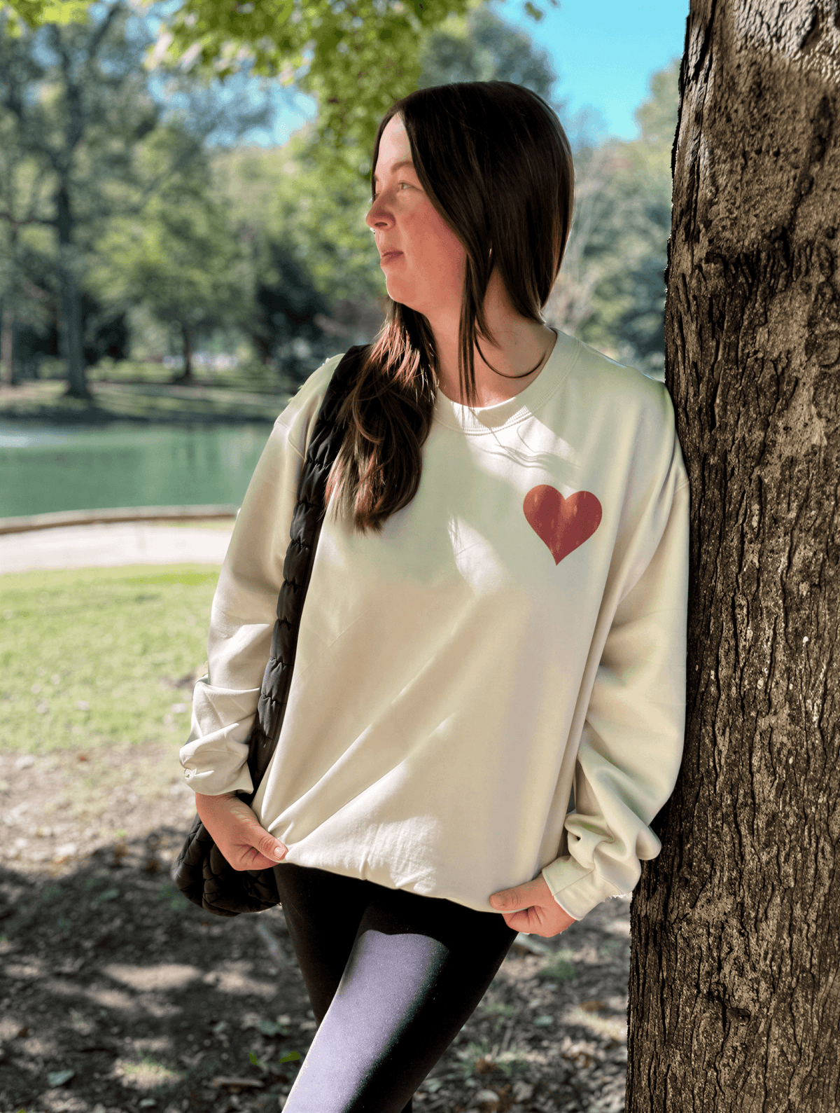model wearing Take Heart Sweatshirt