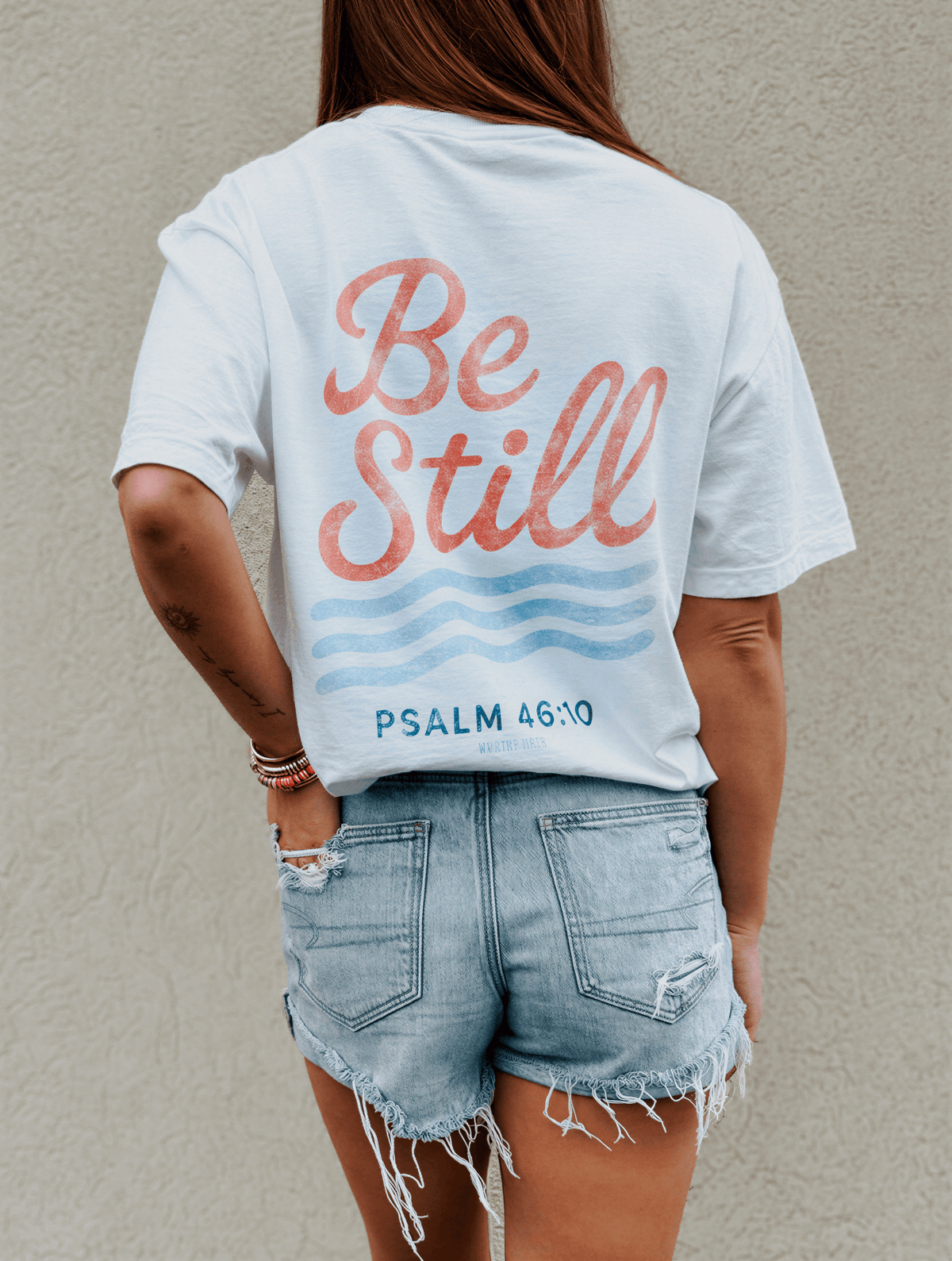 model wearing Be Still Tee