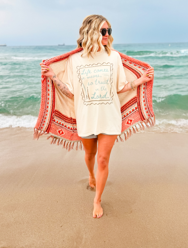 model wearing Life Comes In Waves Tee
