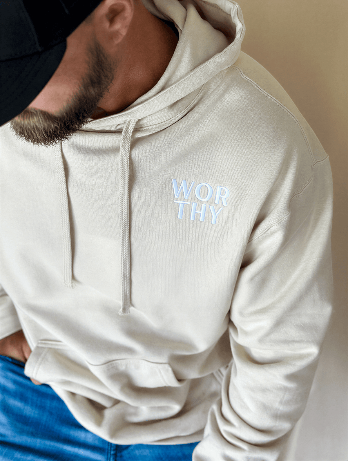 model wearing Worthy Embroidered Hoodie - Dust