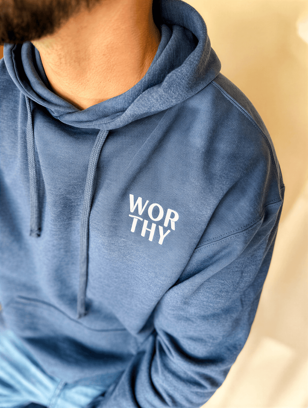 model wearing Worthy Embroidered Hoodie - Navy