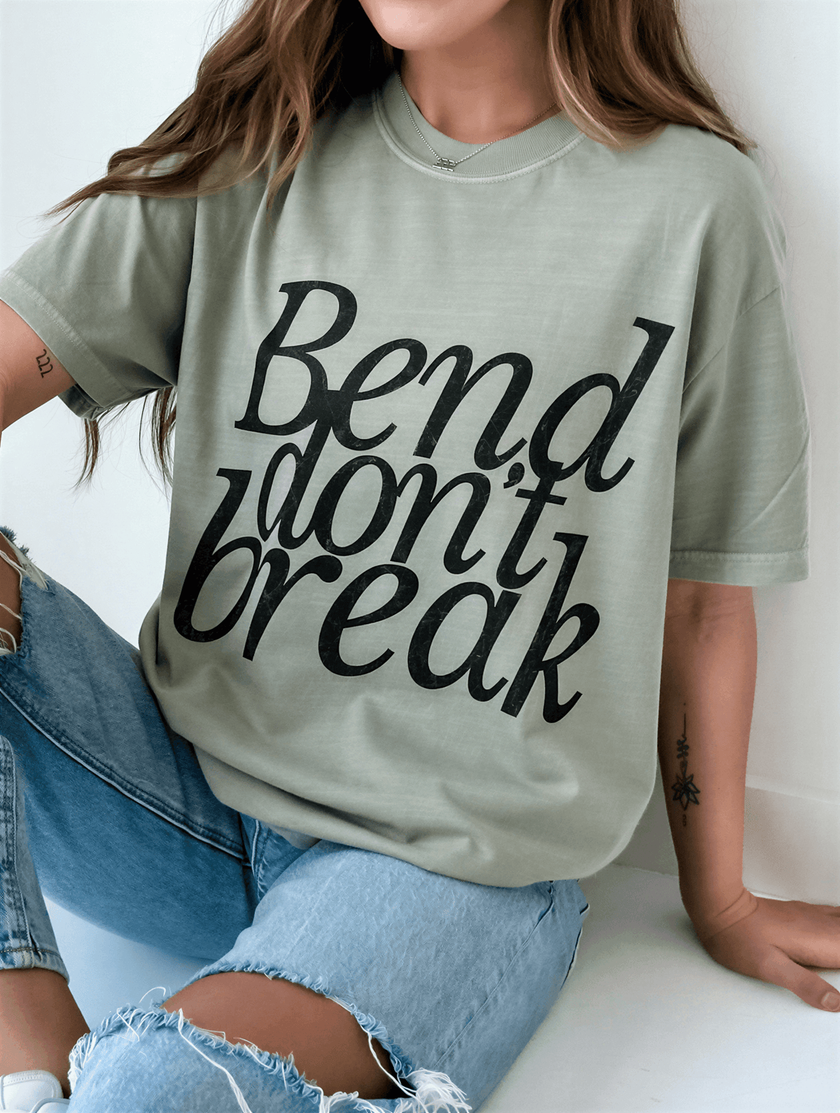 model wearing Bend Don't Break Tee