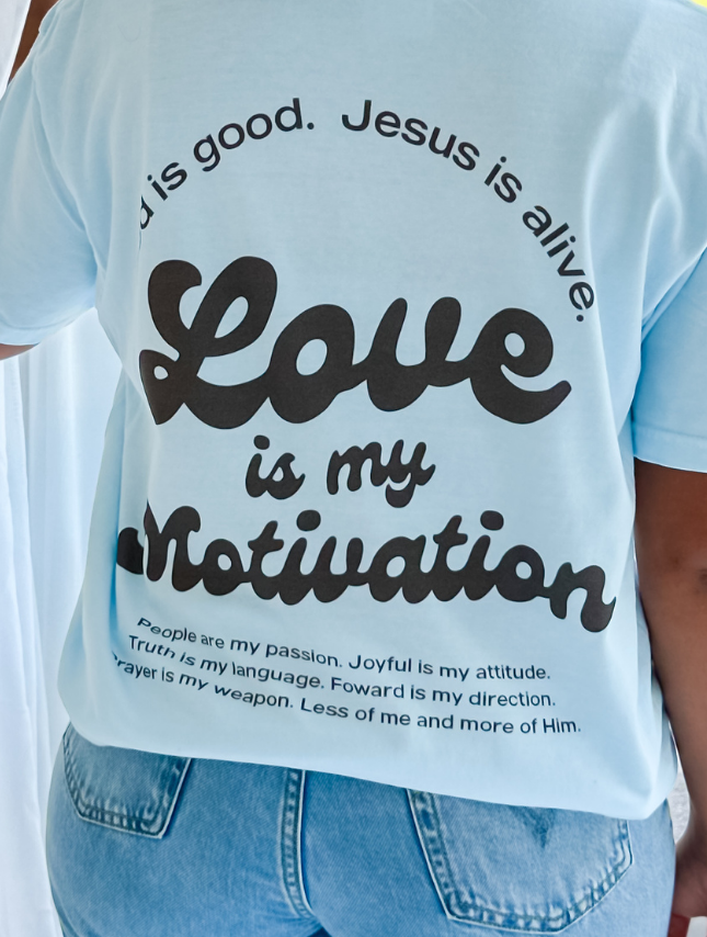 model wearing Love Is My Motivation Tee