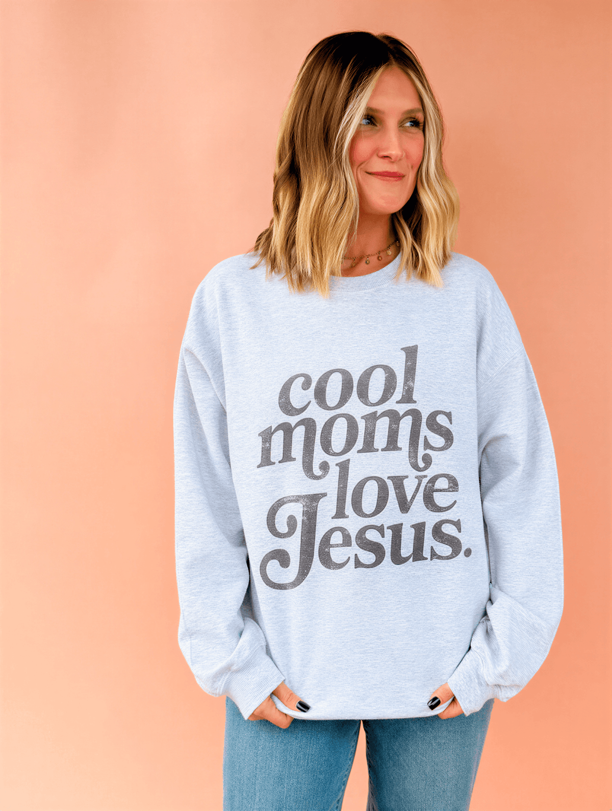 model wearing Cool Moms Love Jesus - Ash Sweatshirt
