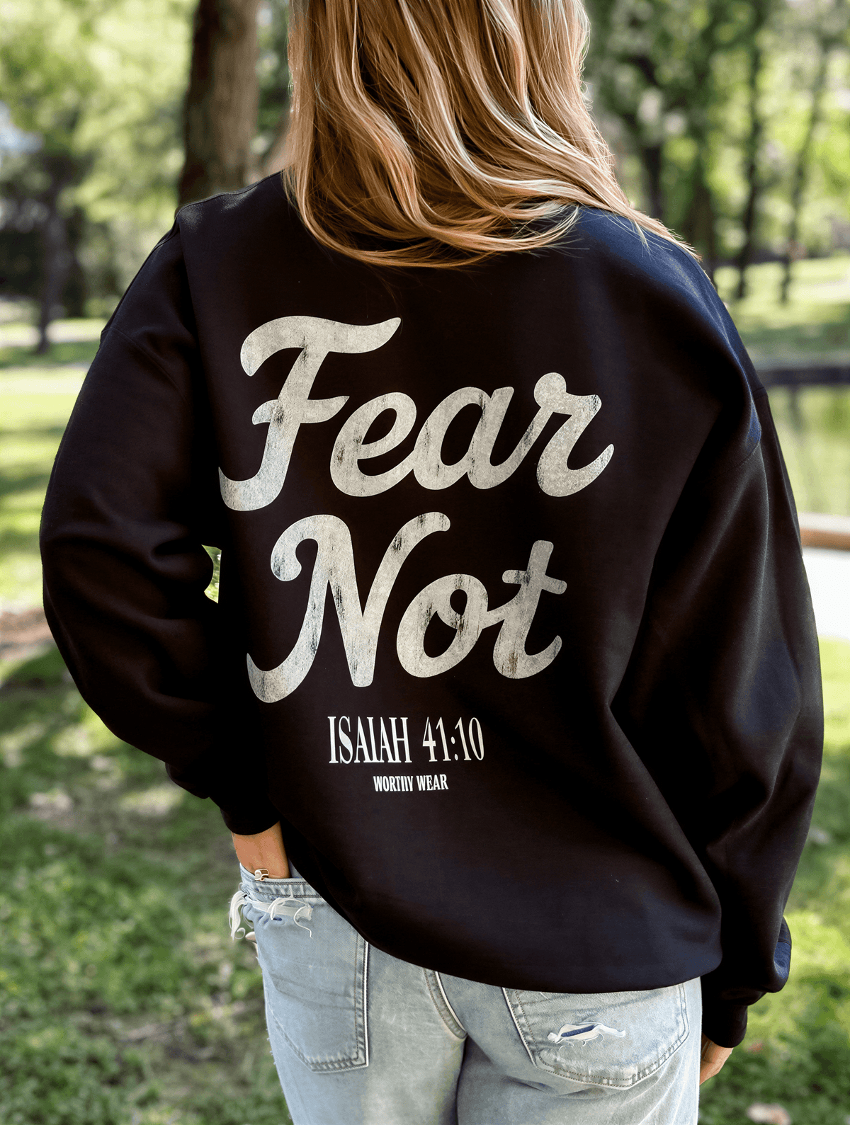 model wearing Fear Not Sweatshirt