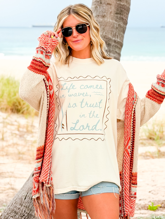 model wearing Life Comes In Waves Tee