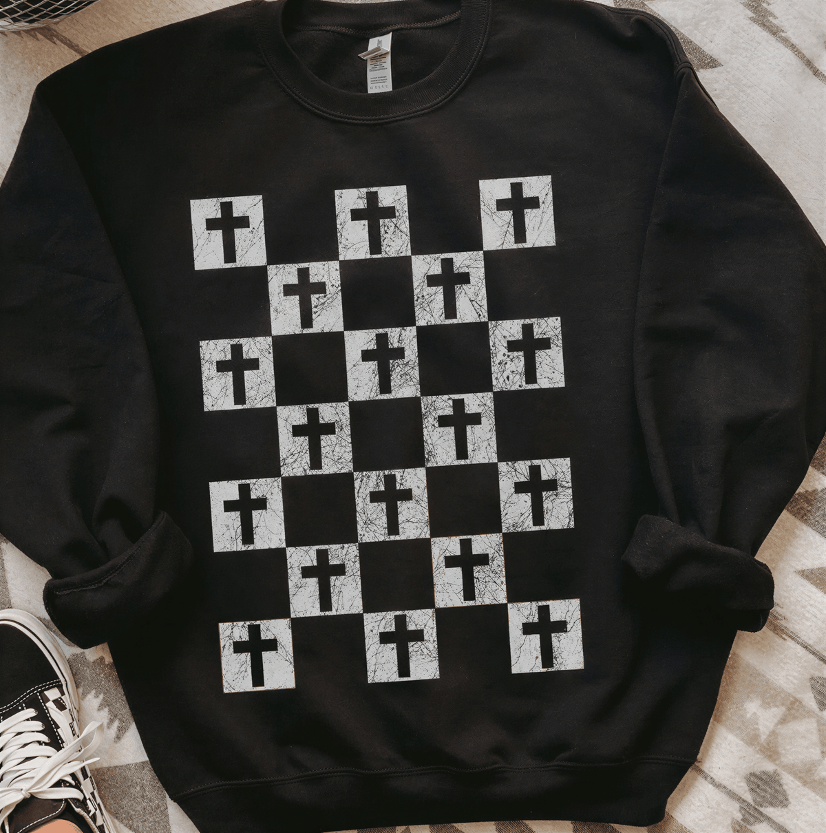 flay lay of Bold Crosses - Black Sweatshirt