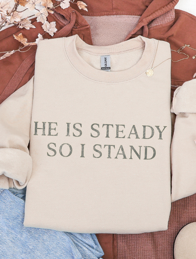 flat lay of He Is Steady Sweatshirt
