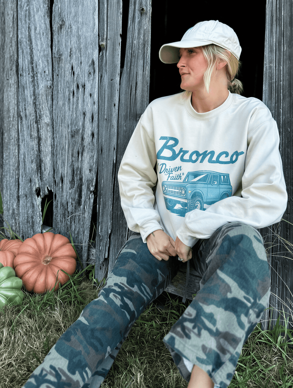 model wearing Driven By Faith Bronco Sweatshirt
