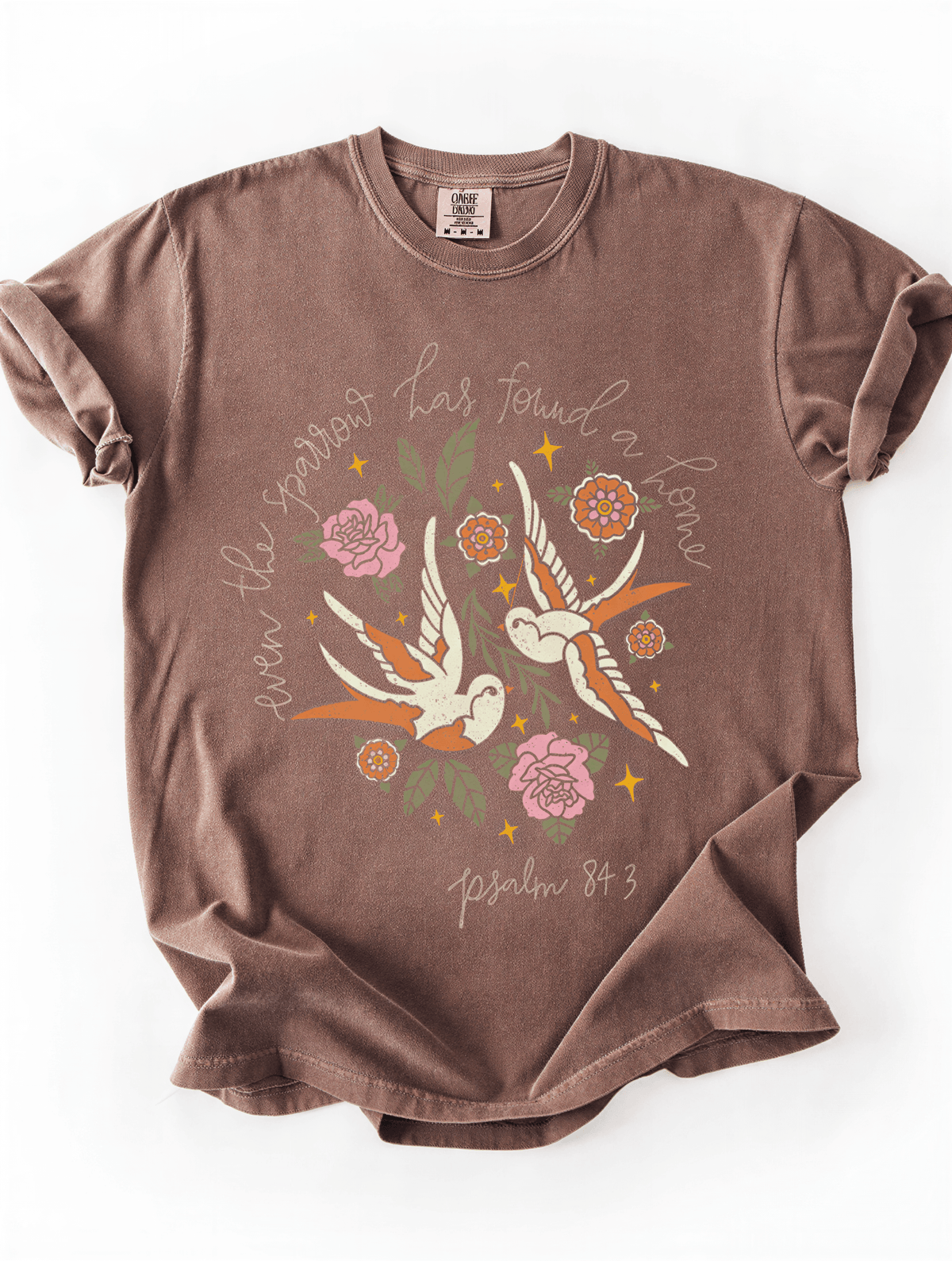 flat lay of Even The Sparrow Tee