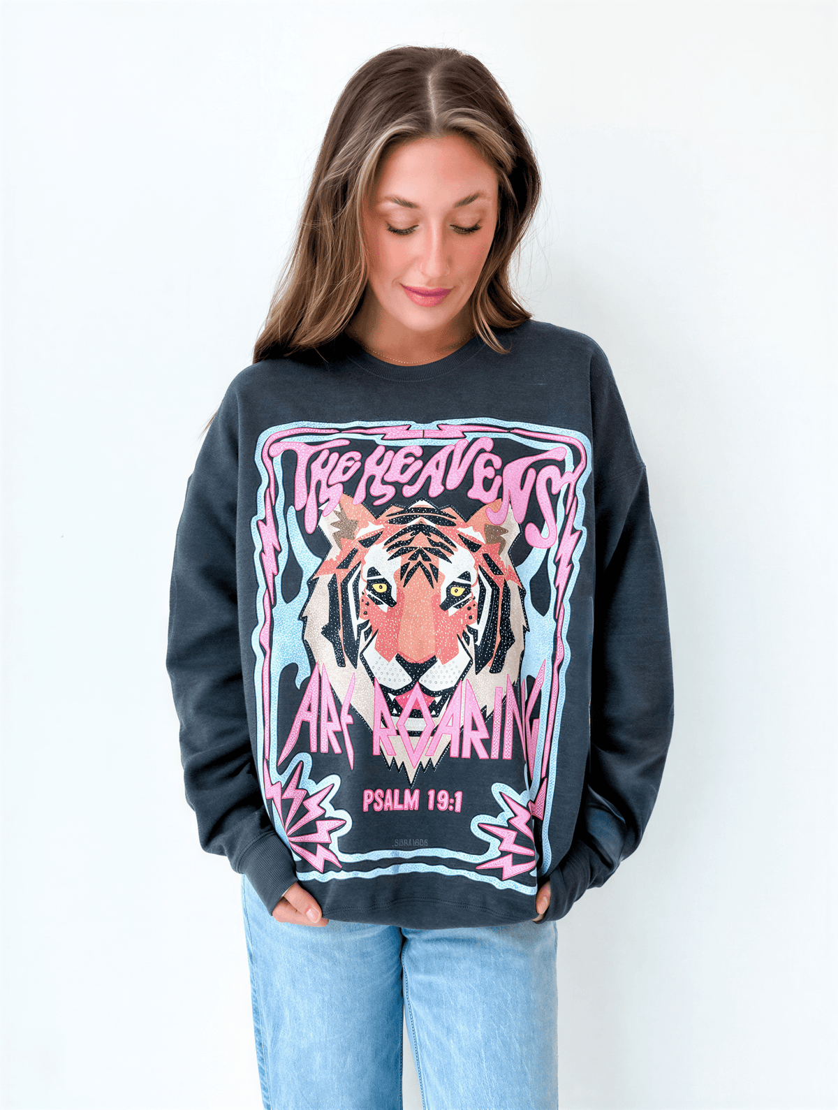 model wearing heavens are roaring tee